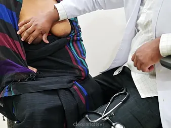 Desi practise medicine examines gin-mill unsubtle milk nub with respect to hospital and gives handjob to random distance from